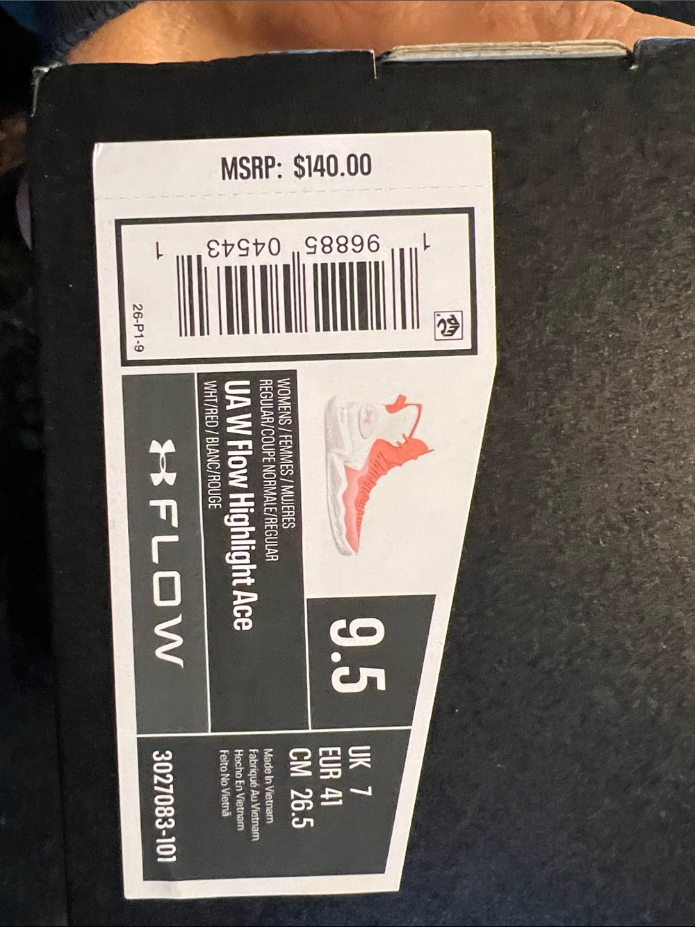 Under Armour women’s Bright Red (more like Orange) and White volleyball shoes
